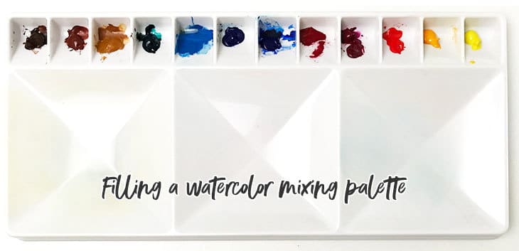 watercolor-palette filling a mixing palette